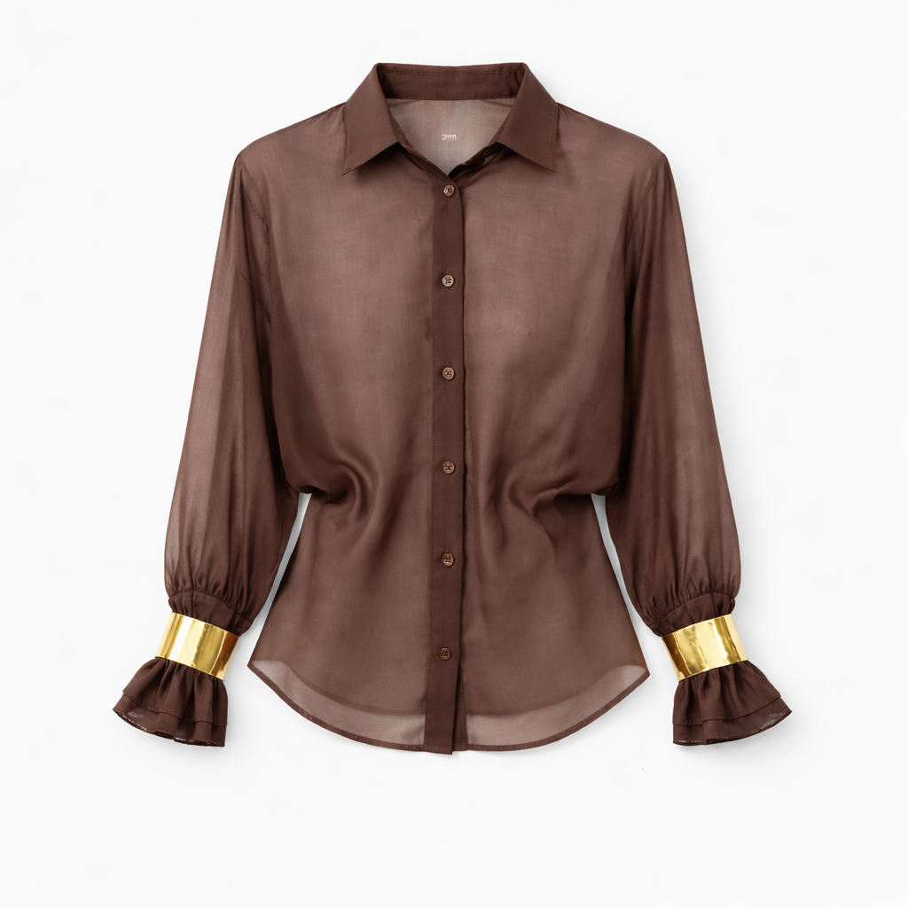 Elegantna srajca z zlatimi zapestnicami